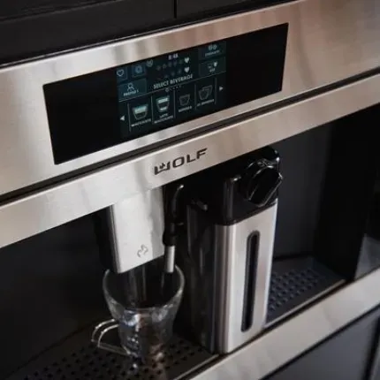 close up of Wolf coffee machine with milk steamer